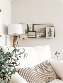 The Ultimate Renter Decor Guide: Damage Free Hanging - Floor lamp hidden behind couch