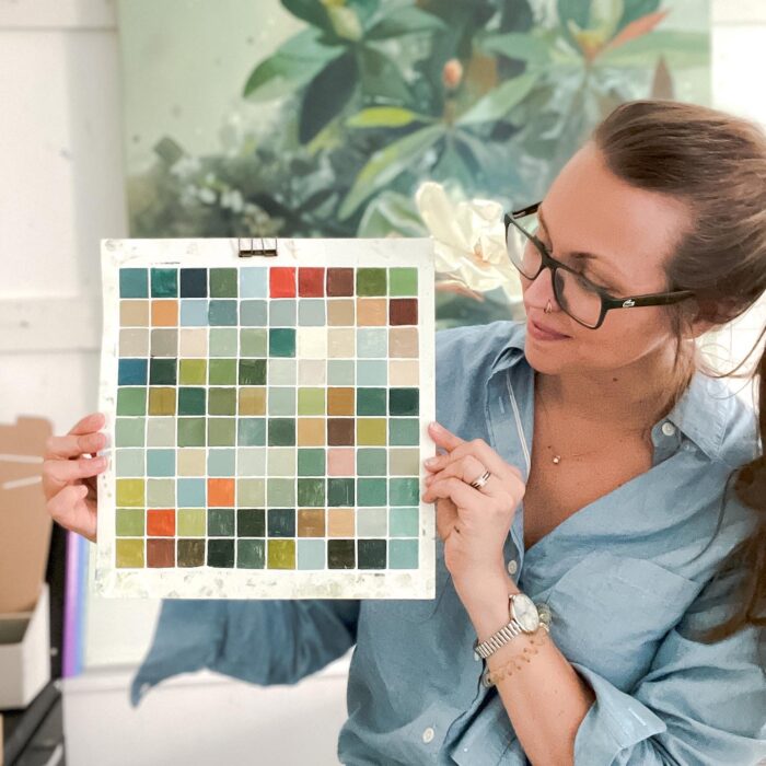 Creative block: An artist holding an art print