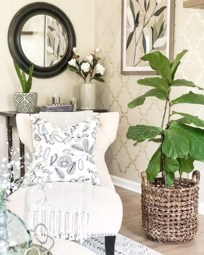 Alternative Living & Functional Framing: A living room corner surrounded by plant life.