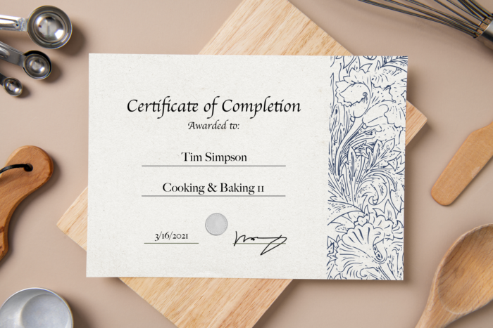 A certificate of completion in a kitchen.