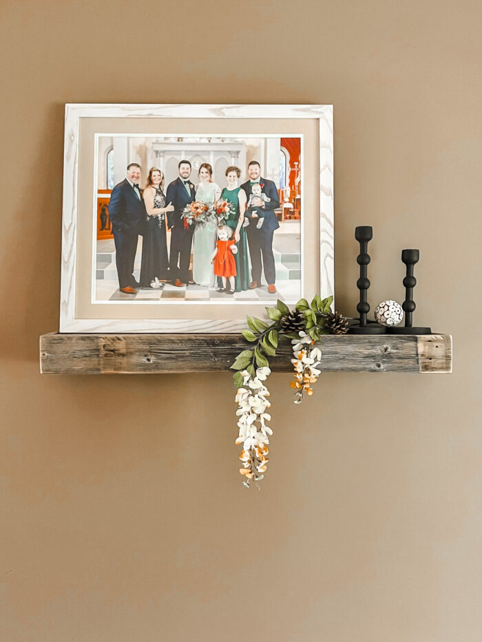 Framing Life Events: a framed wedding ceremony on a hanging shelf 
