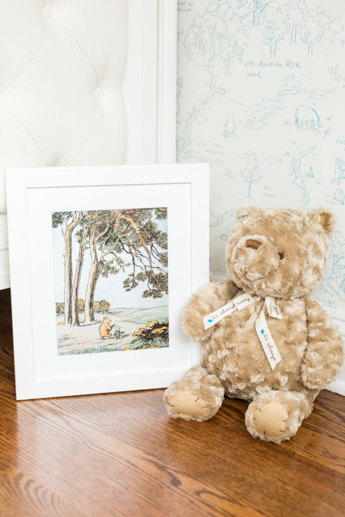 White picture frame with a nature photo