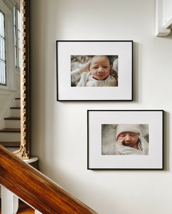 Framing Life Events: Baby photos hung by a staircase