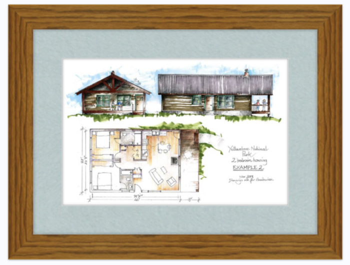 Framed blueprints of a cabin