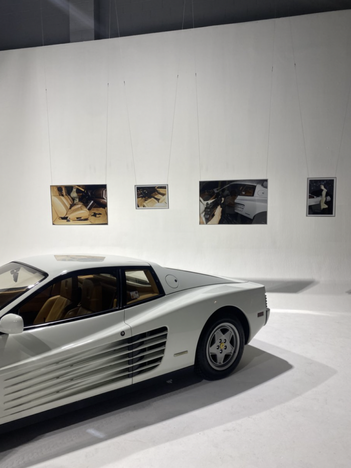 Automotive art: Framed car photography in a dealership