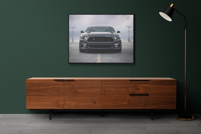 Automotive art: Framed car photography above a dresser