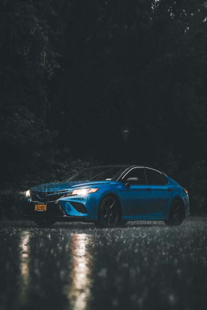 Car photography 101: A blue sedan in the rain