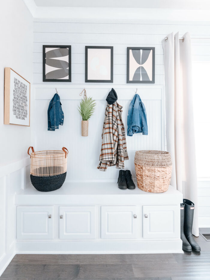 Level Framing: A hallway with framed geometric-shaped art.