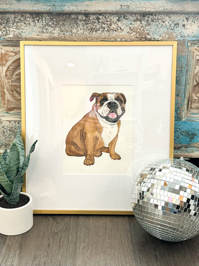 A framed custom pet portrait 