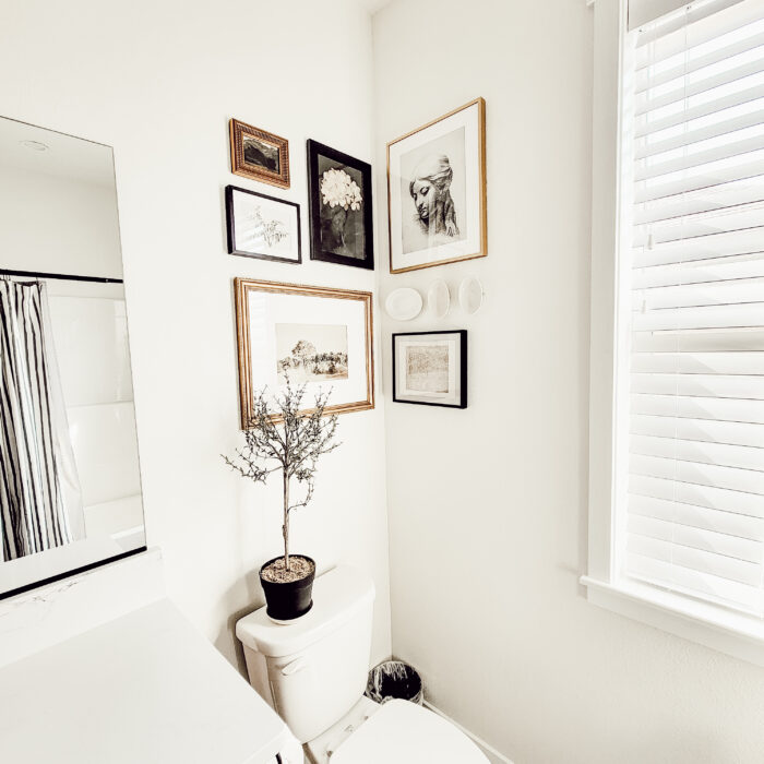Picture Frame Arrangements: a bathroom corner wall display