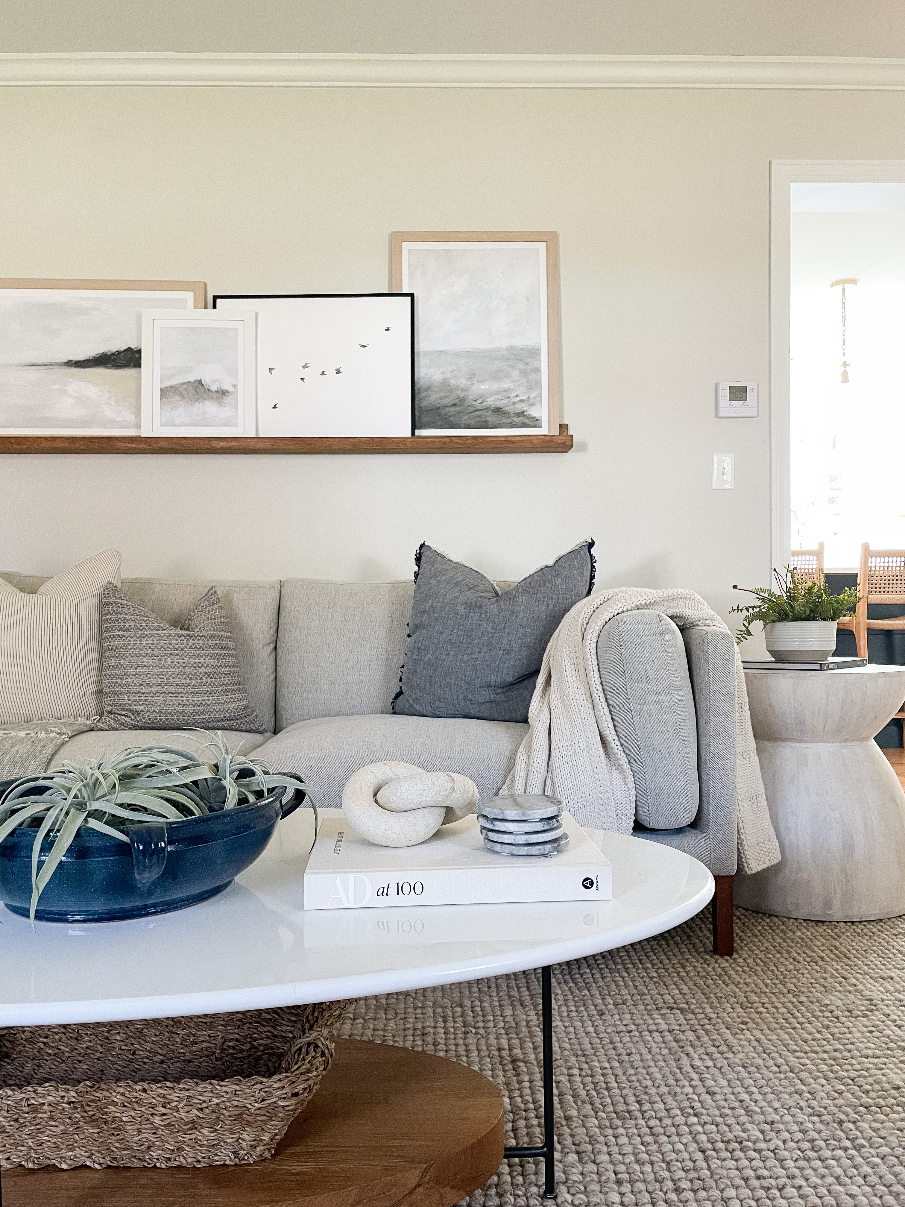 Picture Frame Arrangements: A living room shelf display