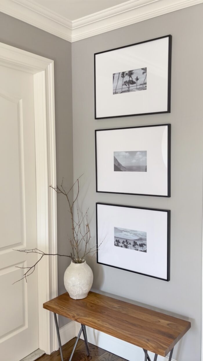 Picture Frame Arrangements: An entryway of vertical frames