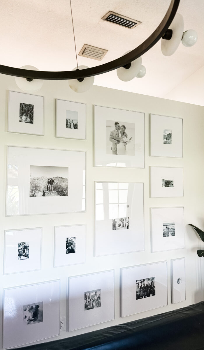 Picture Frame Arrangements: A black and white staggard wall gallery 