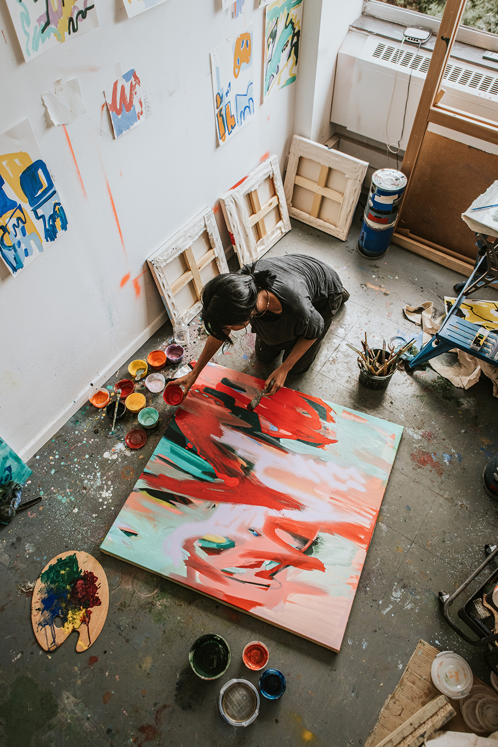 Ecommerce Tools: A lady painting in her studio