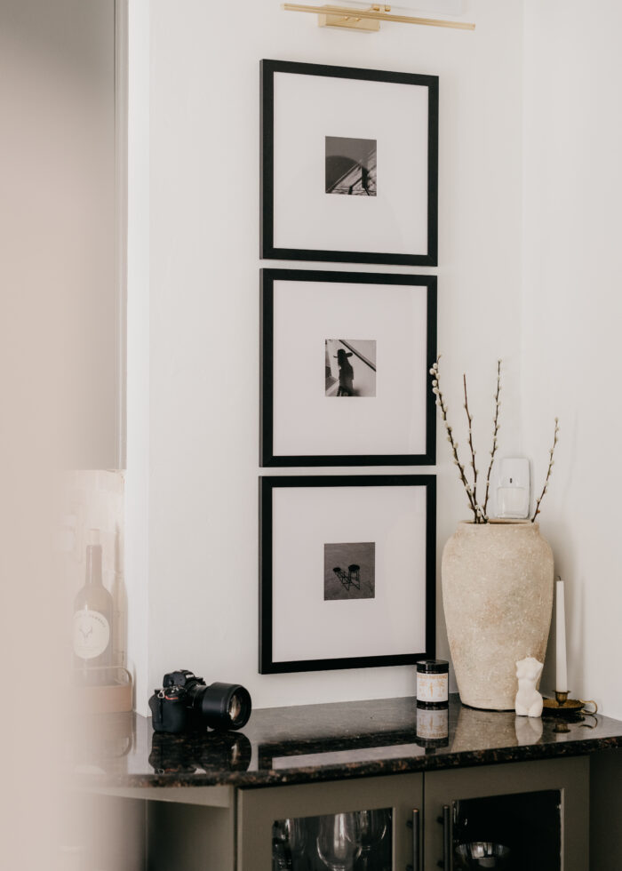 Picture Frame Arrangements: Counter space covered! A cute vertical column of frames. 