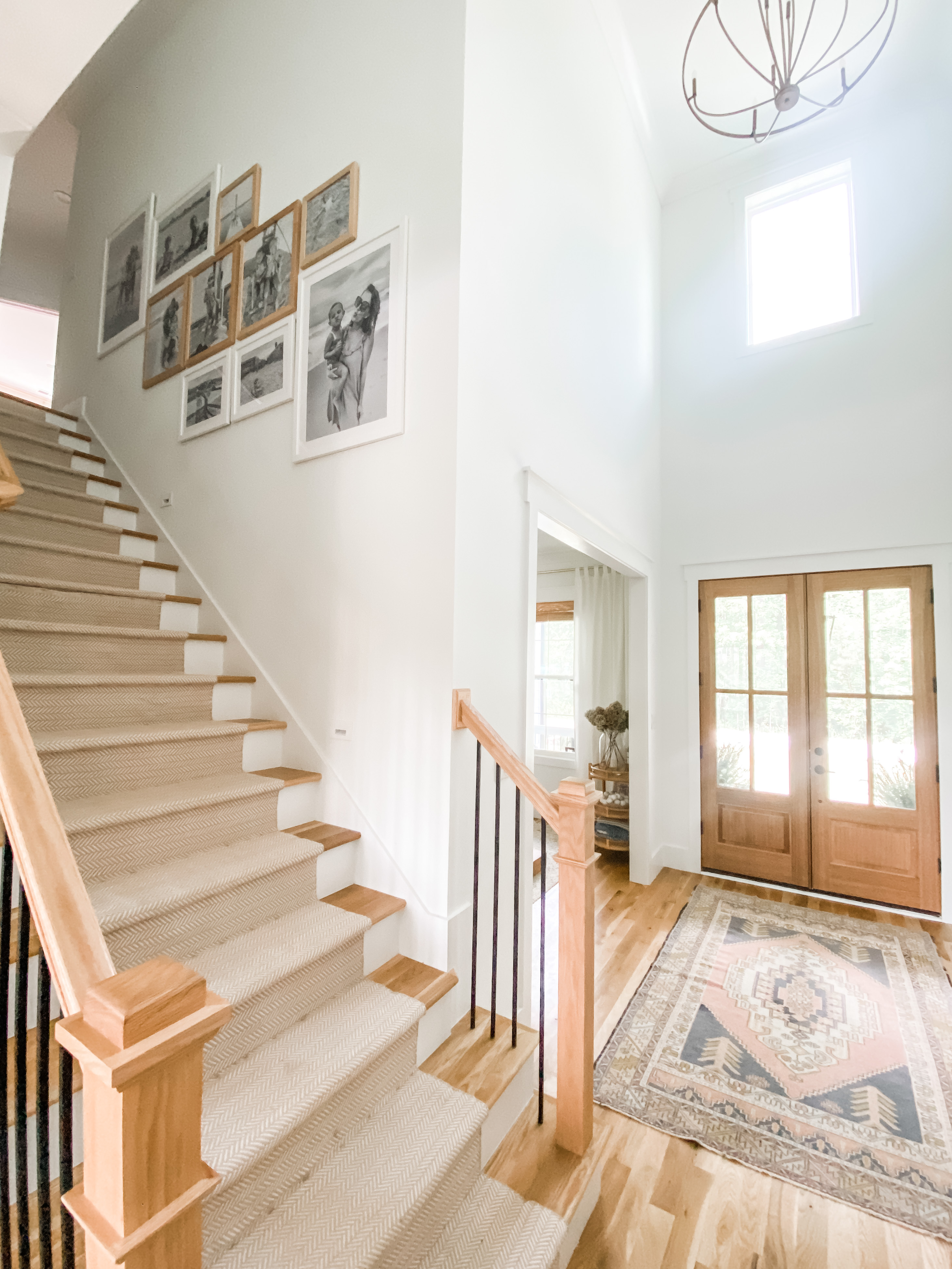 A staggered gallery wall on a staircase. 