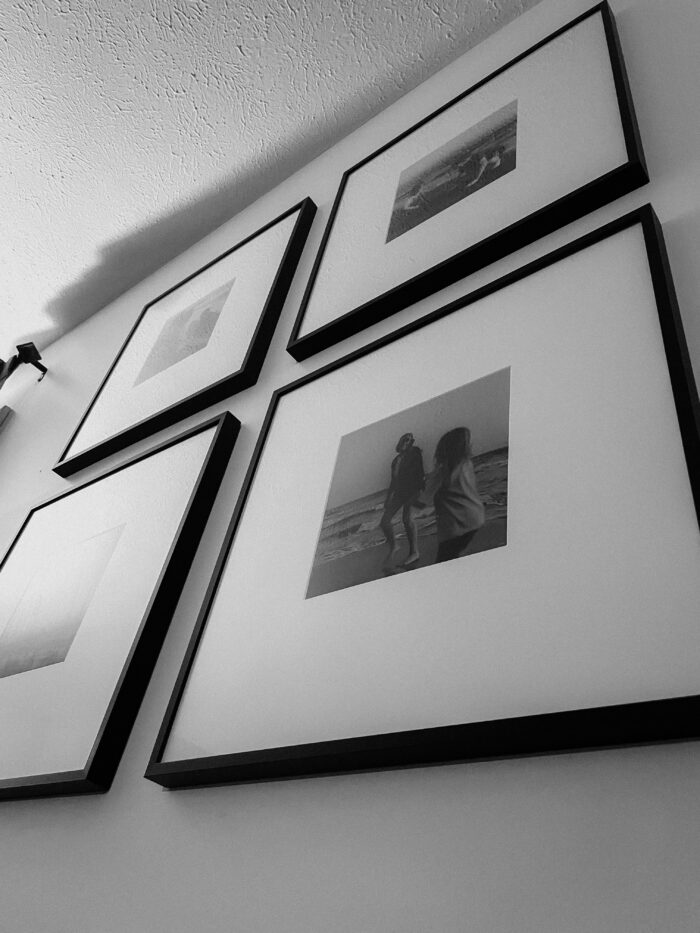 Anatomy Of A Picture Frame: A black and white gallery wall in an Ashford style frame. 