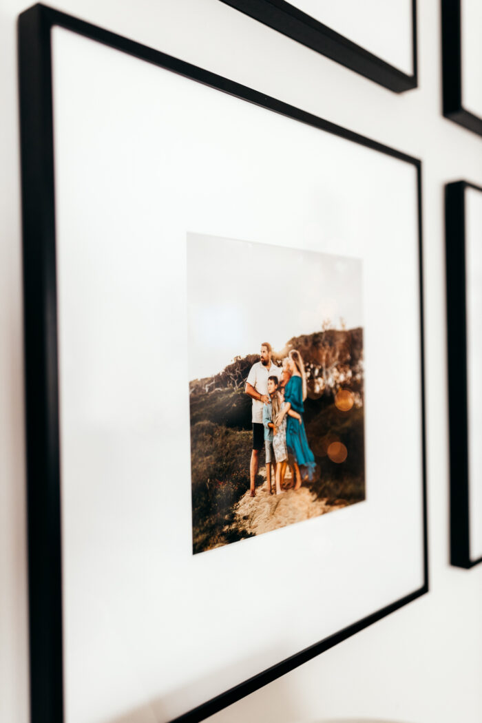Anatomy Of A Picture Frame: A family photo on a Gloss Black Ashford frame.