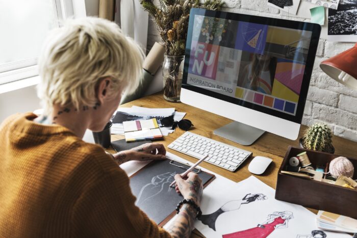An artist designing their online art shop