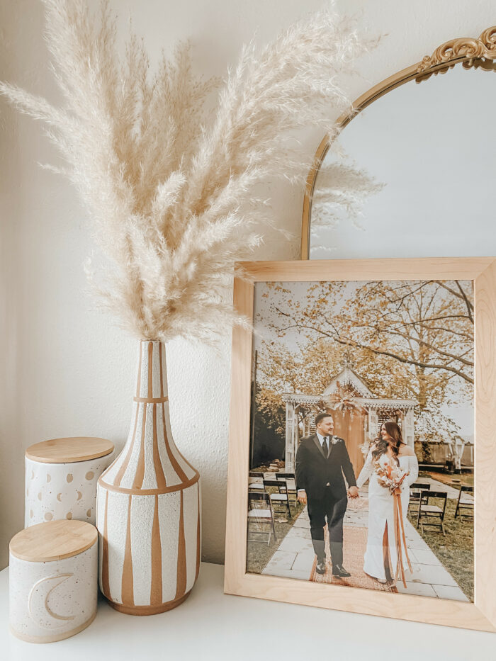 The Ultimate Wedding Photography & Display Guide: A shelf display of a newlywed couple in a Dayton frame in the color Sand. 