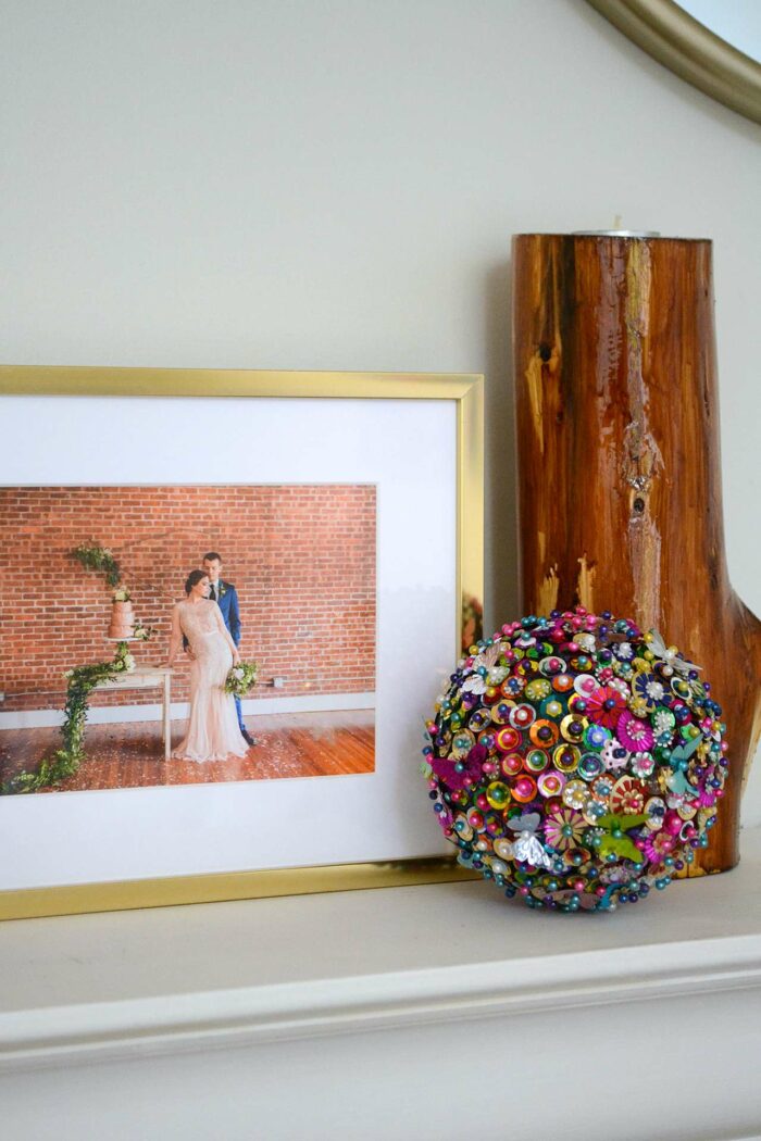 Unique Engagement Photo Ideas for Unforgettable Memories: A couple photo on a shelf with decor