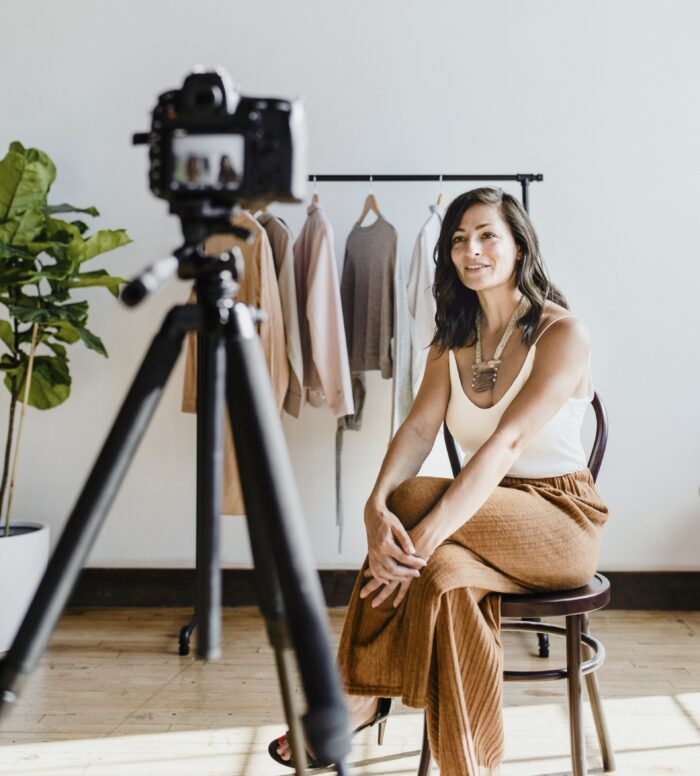 A woman filming for social media