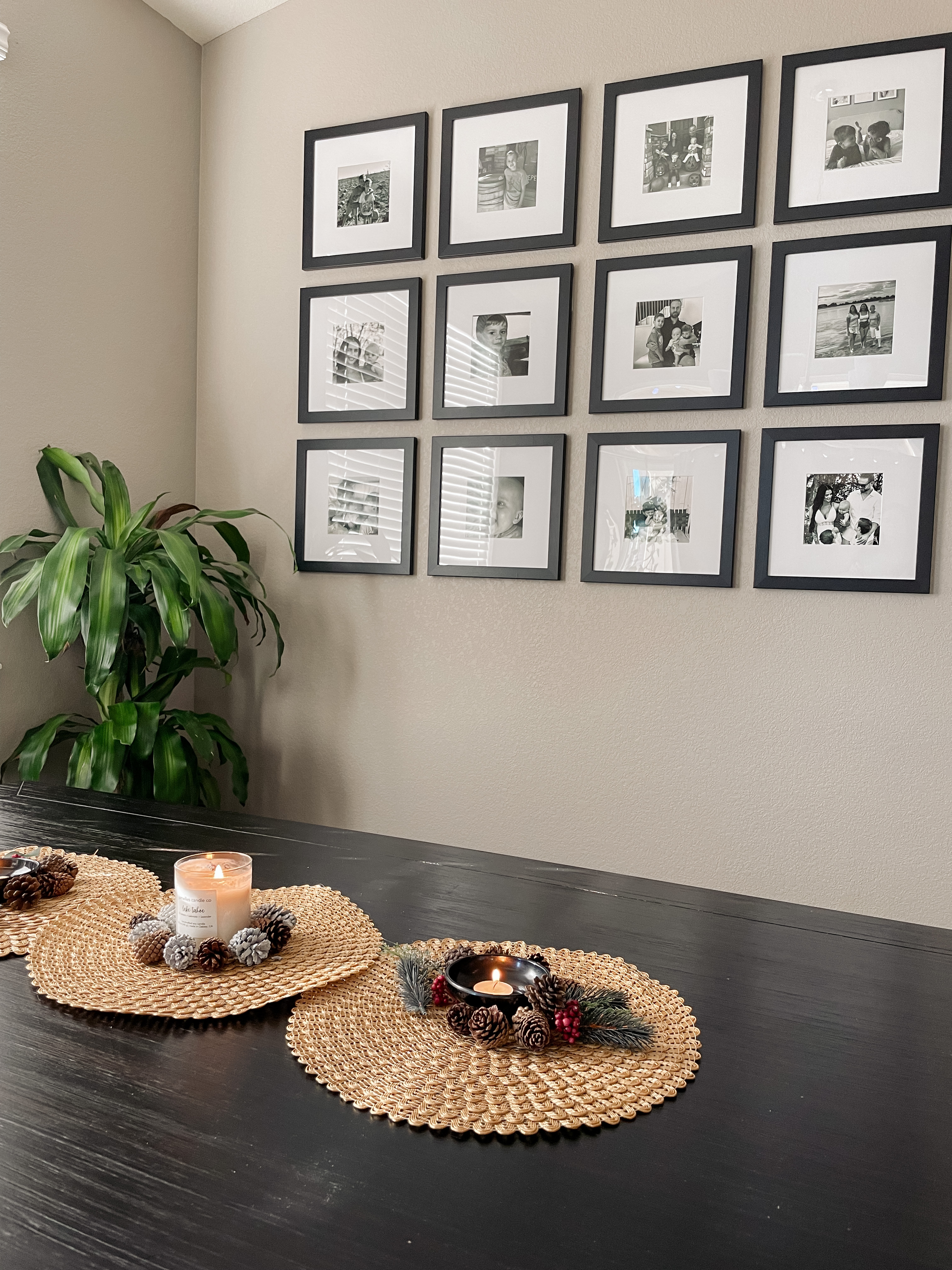 Decor Dilemma: Should Picture Frames Match The Art Or Room? - A dining room with a grid style gallery wall.