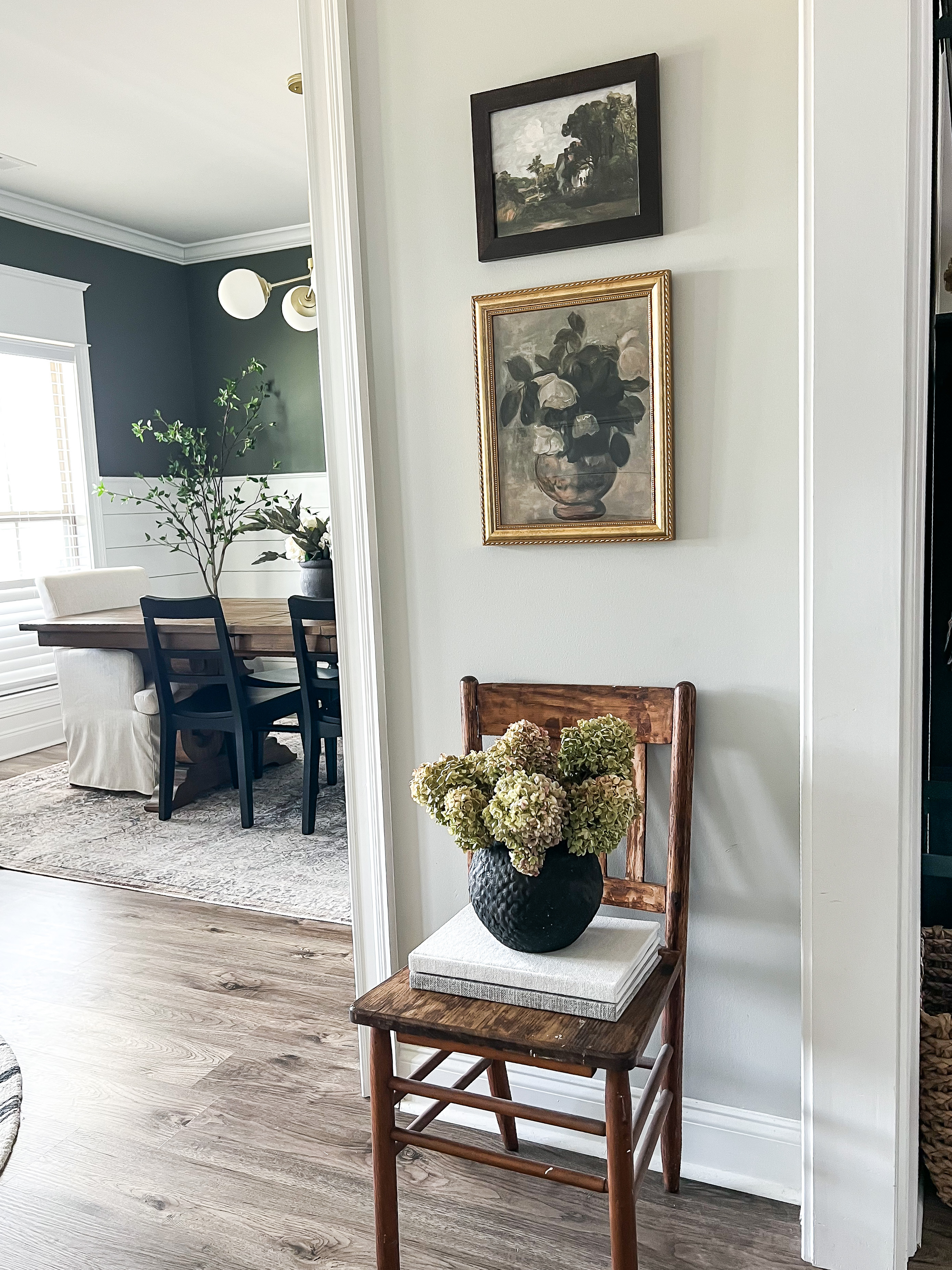 Decor Dilemma: A small hallway space with two different frames.