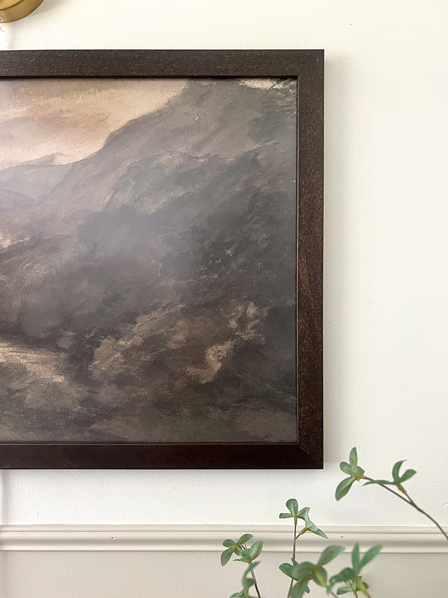 Why Is Framing So Expensive? - A close up of a rustic artwork framed. 