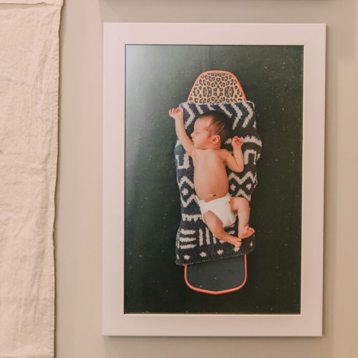 The Perfect Baby Picture Frames: A frame photo of a newborn on a skateboard