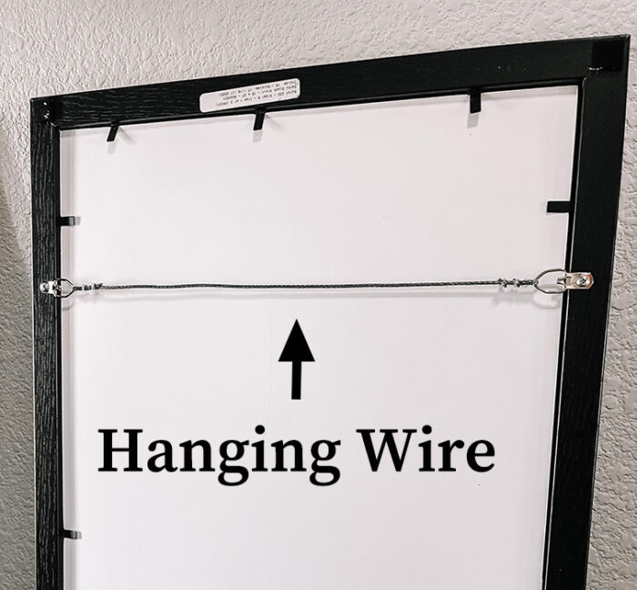 Hanging wire on the back of a wooden frame
