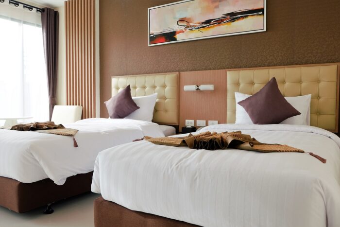 Hotel Room Decoration 101: Hotel beds with framed art 