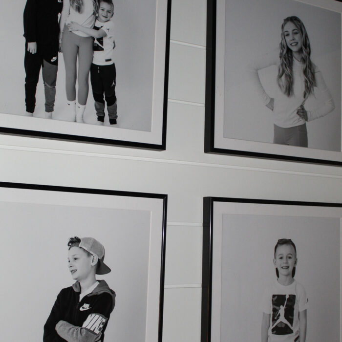 A close up of black and white photos in black square