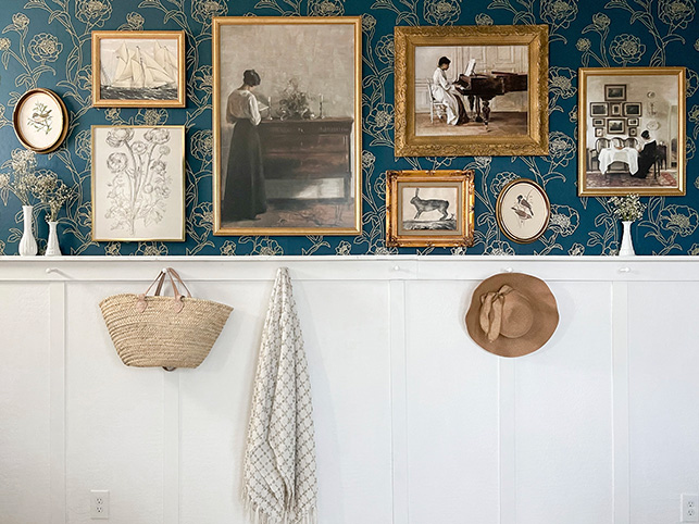 mix and match frames with an eclectic wallpaper background