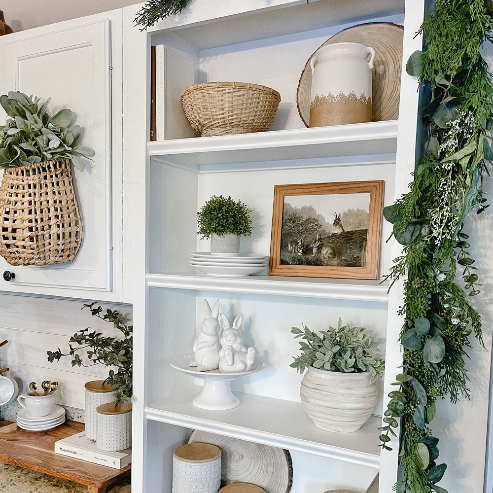 Eco-Friendly Decor Tips: A wood frame rests in a bookcase. 