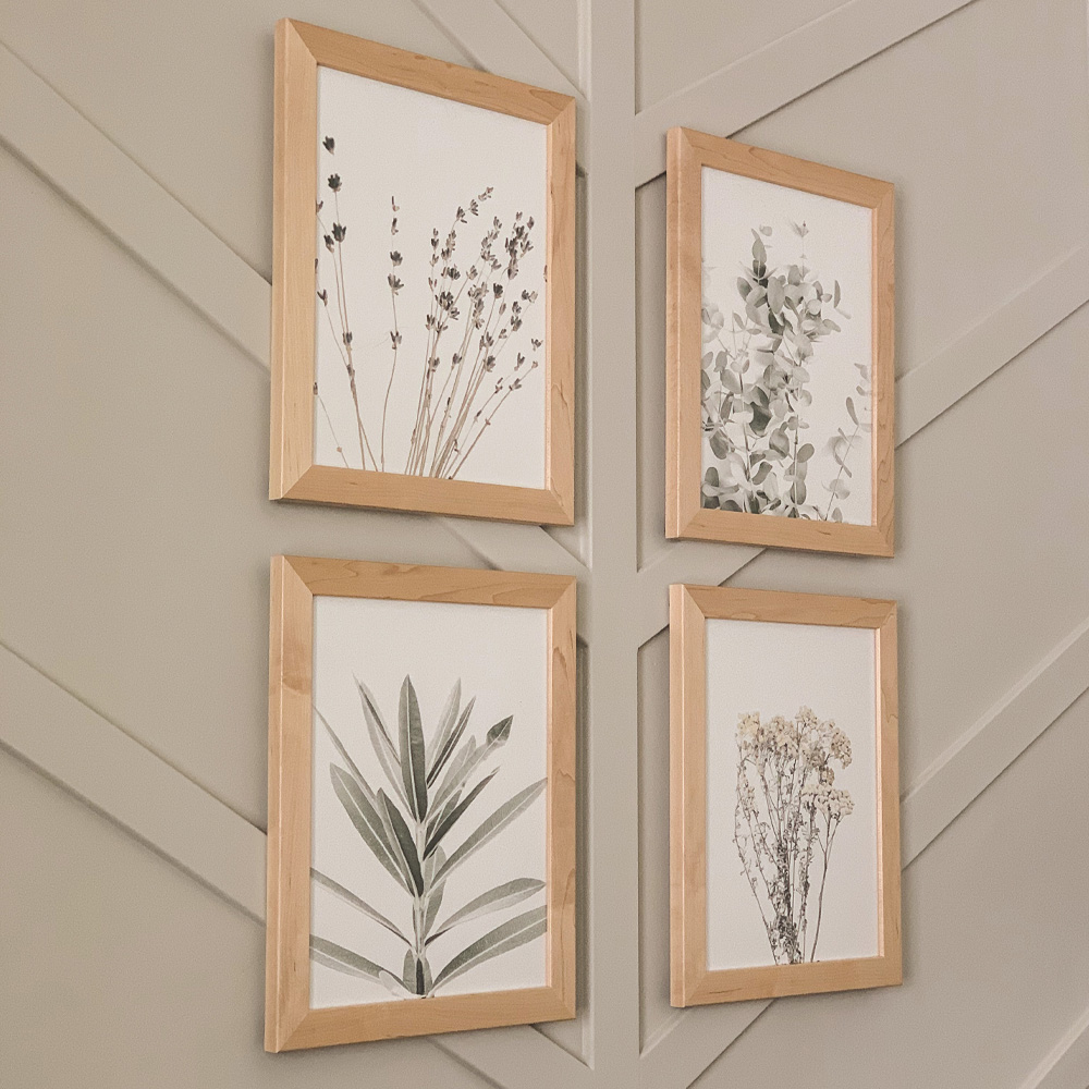 Eco-Friendly Decor Tips: A 2x2 grid gallery wall.