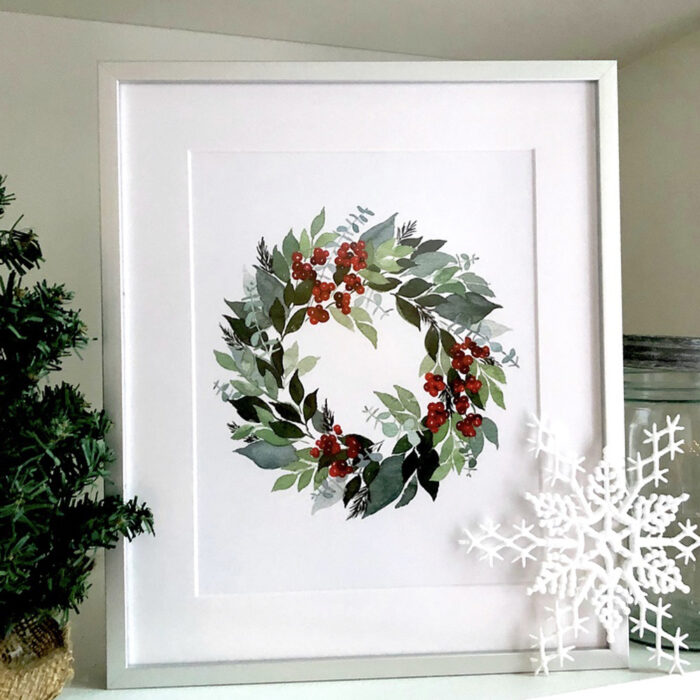 Custom Framing: A custom painting of a holiday wreath. 