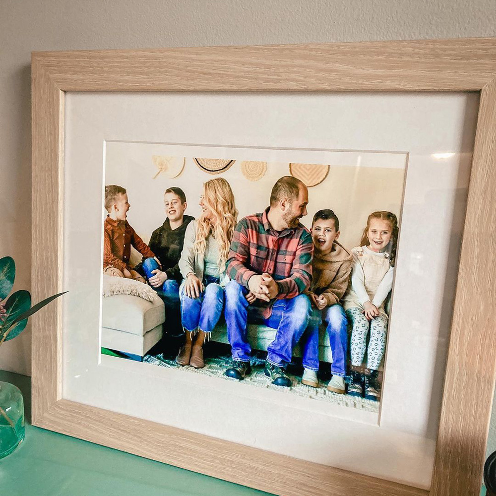 Family Picture Ideas: A candid family photo on a couch. 