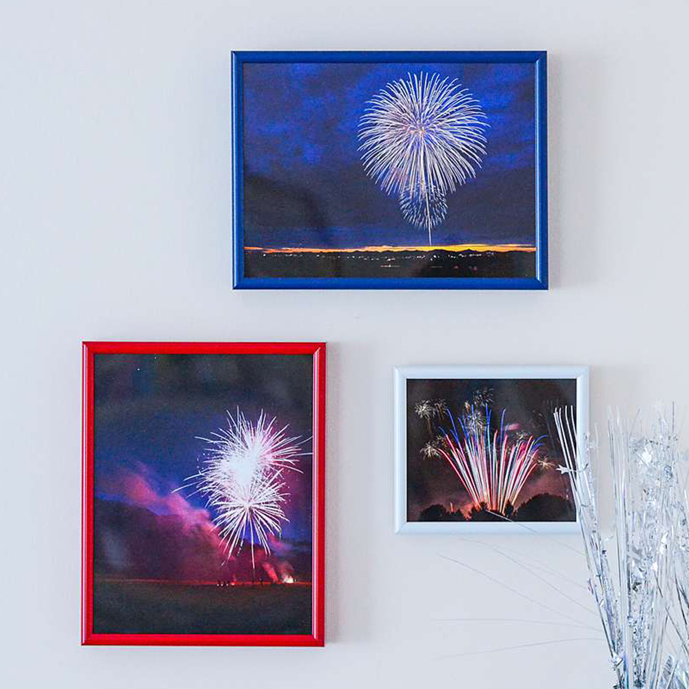 Custom Framing: framed photos of fireworks. 