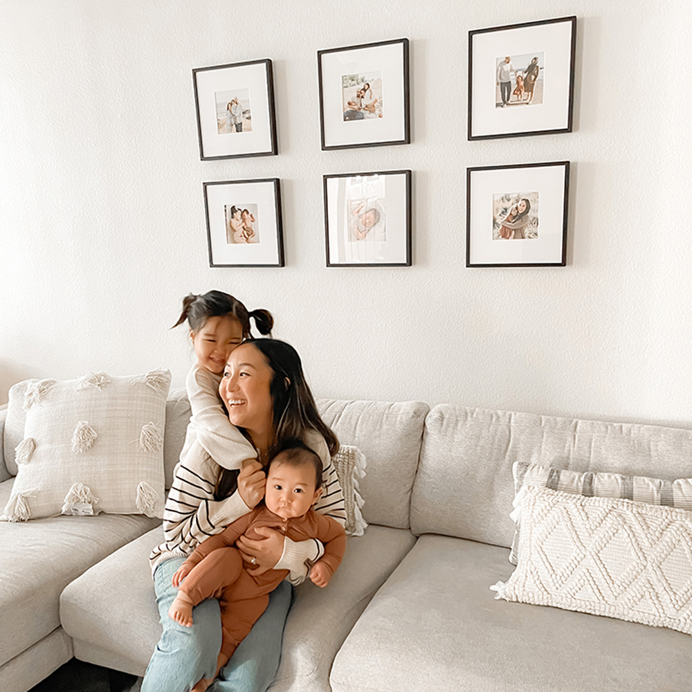 Family Picture Ideas: A 3x2 family photo gallery wall in a living room.