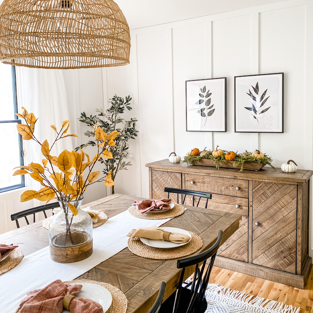 Custom Framing: a dining room with two framed plant prints