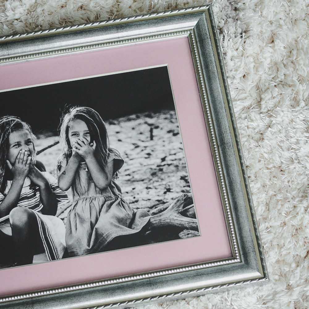 Custom Framing: A framed black and white photo of two girls 