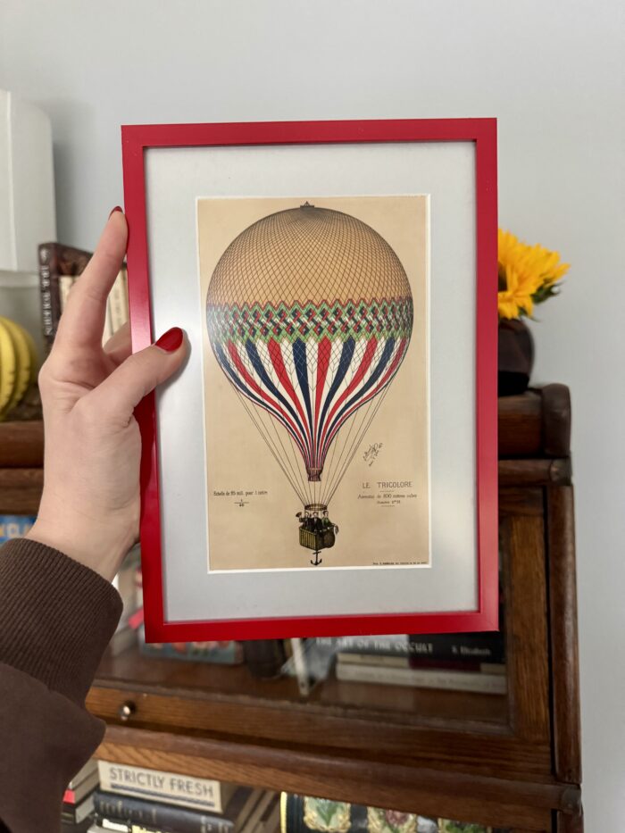 hot air balloon print in red frame
