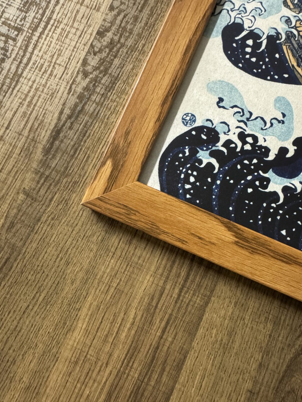 The Great Wave", by Katsushika Hokusai custom printed on art paper, framed with Derby, in Hazel