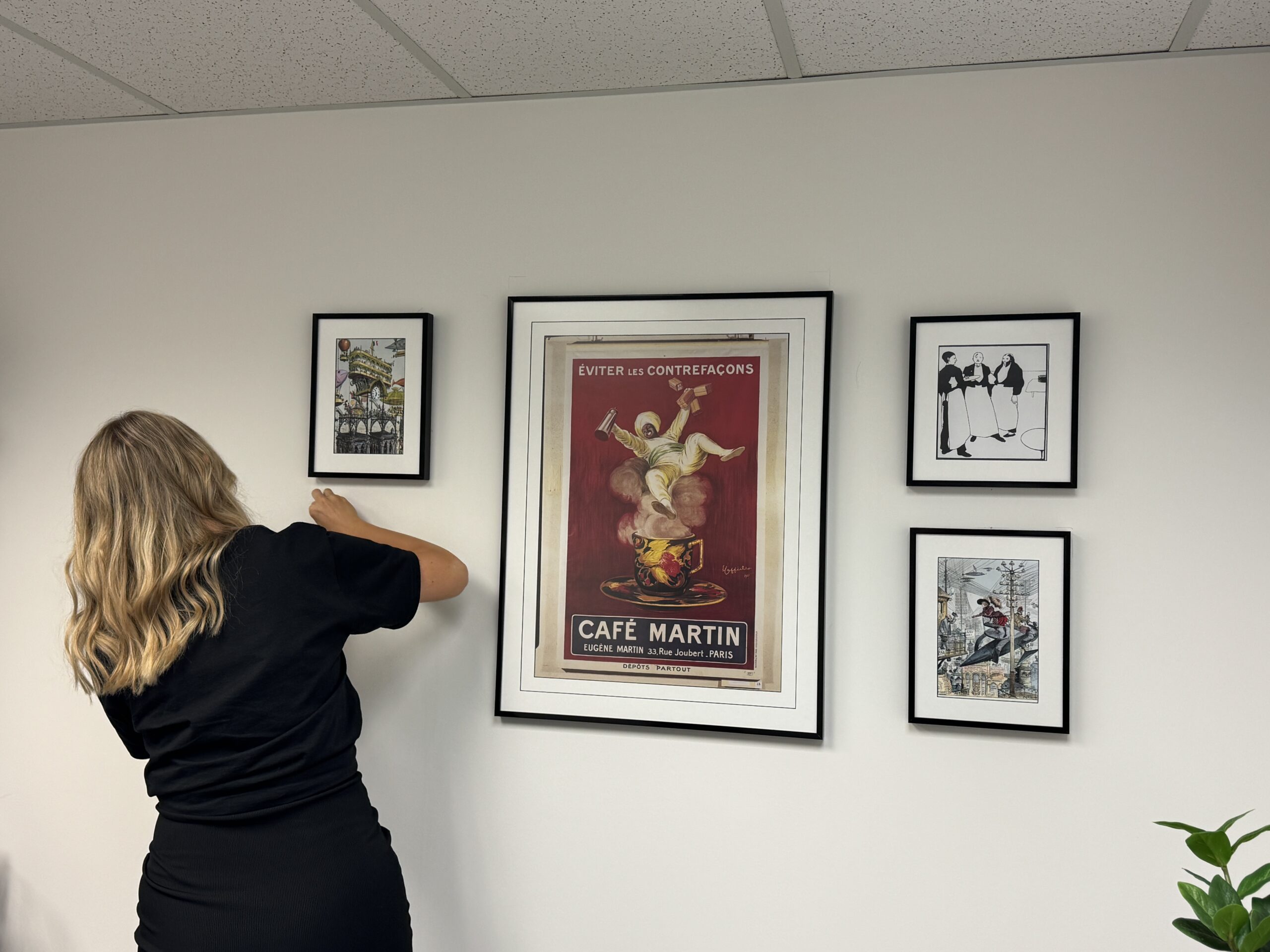 gallery wall of framed art prints