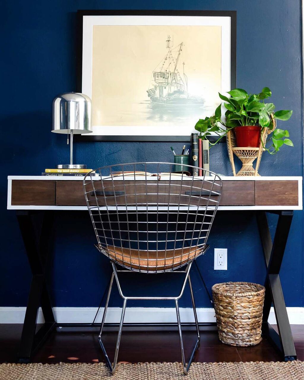 large coastal print above a desk