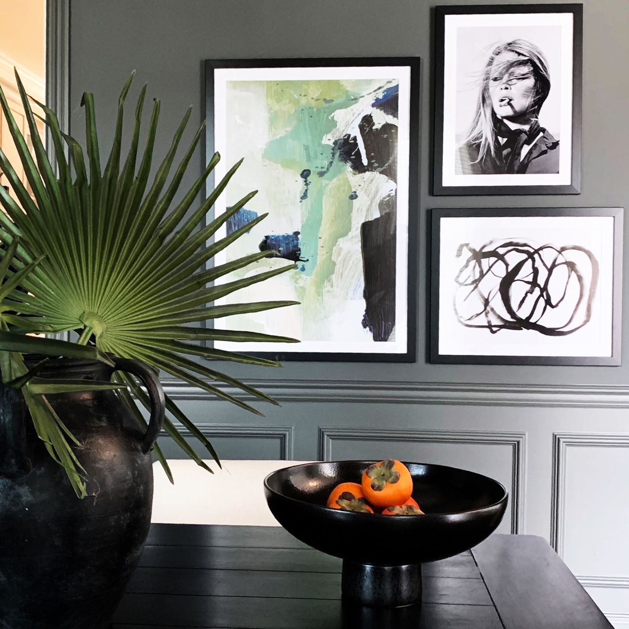 Why Framing Matters When Selling Art Online 1 gallery wall of black metal picture frames