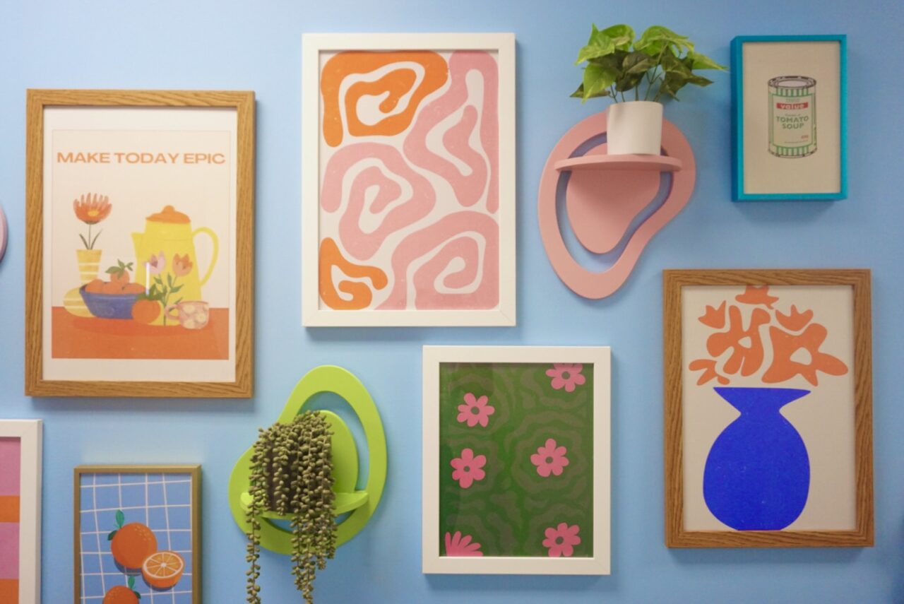 All the Ways to Customize Your Frame (Yes, We Mean All of Them) 1 colorful art prints on a gallery wall