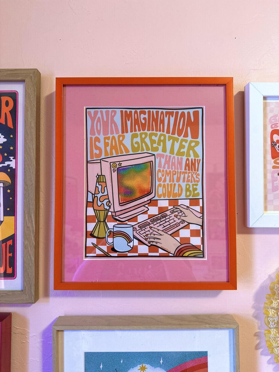 Affordable Custom Frames for Students (Yes, Really) 18 frame on an eclectic gallery wall